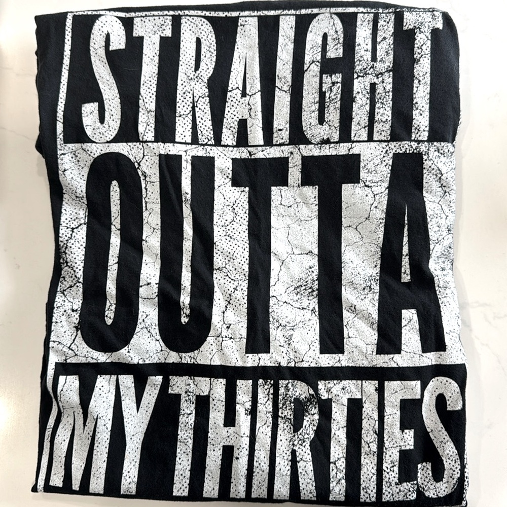 Unknown brand graphic tee. Size 0x